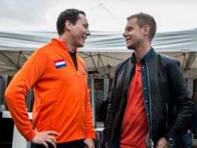 Tiësto et Armin van Buuren en discussion lors d'un événement majeur aux Pays-Bas.